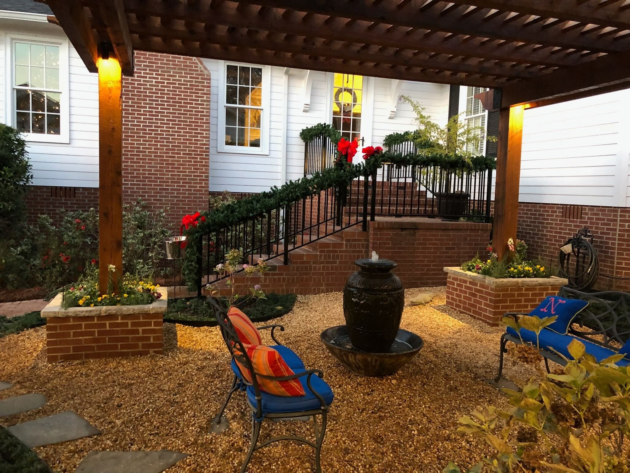 Landscaping crew shaping a front yard with clean edges in Watkinsville neighborhood