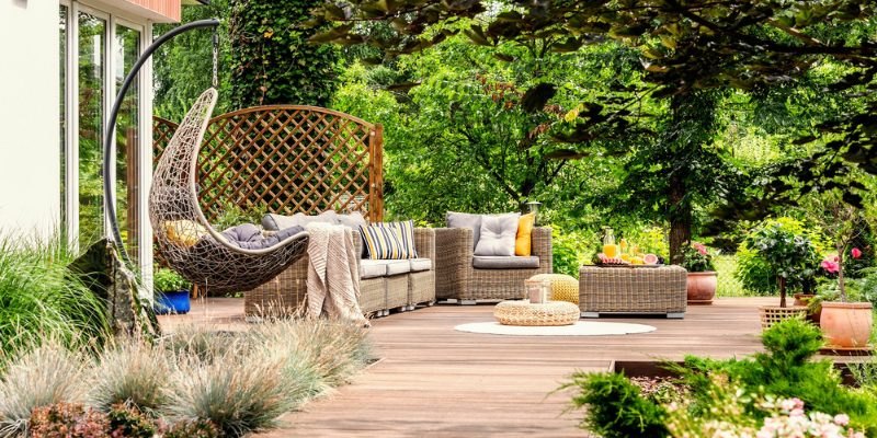 Experienced designer finalizing luxury outdoor living plans for a Macon, GA estate with detailed renderings